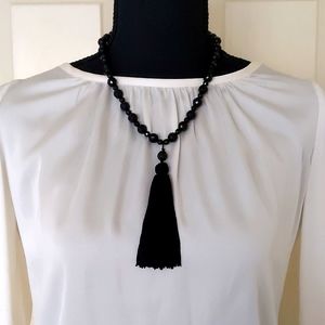 NWOT. The Limited Two Sizes Black Beads w/Tassel Beaded Adjustable Necklace.